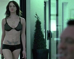Asia Argento nude – Boarding Gate (2007)
