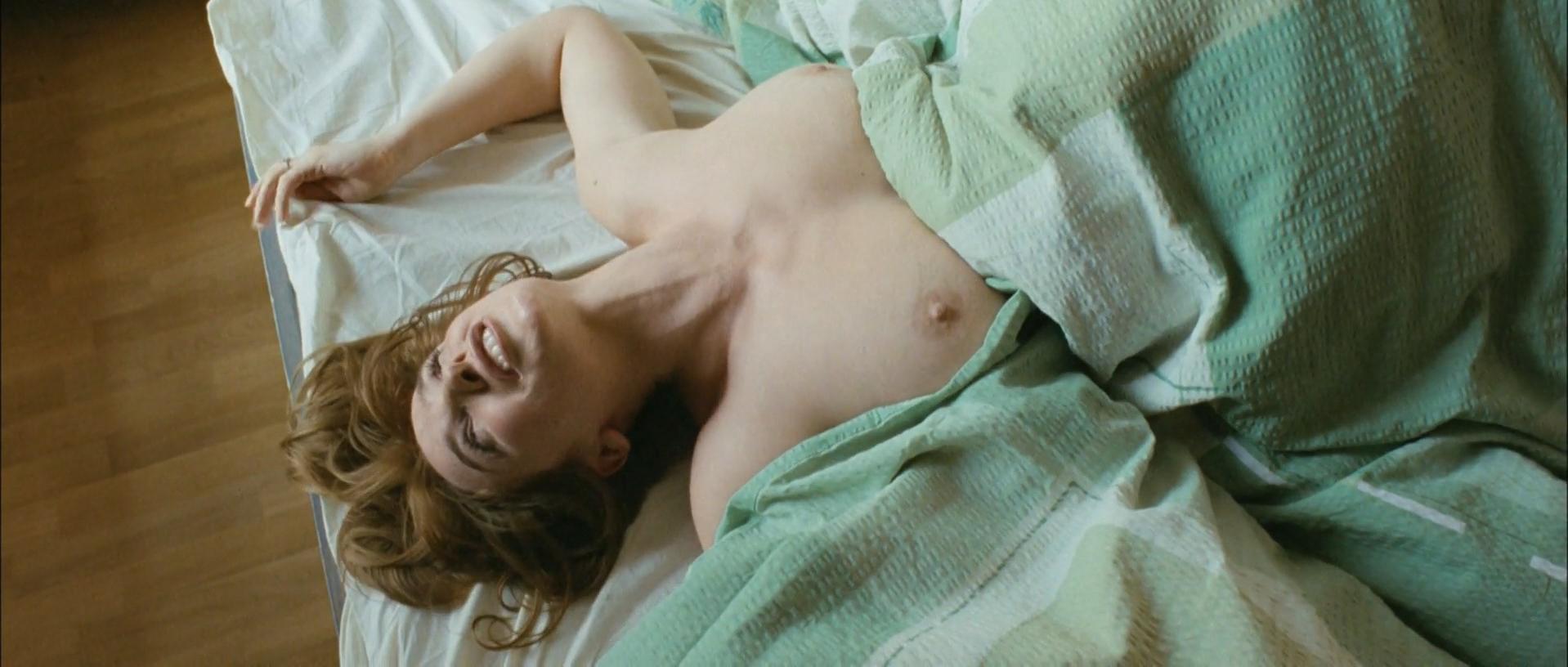 Vica Kerekes in the clip is seen laid on the couch being nude with her male...