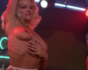Julie Michaels nude – Road House (1989)